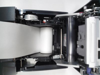 Epson-tm-u220b-paper-roll-02.jpg